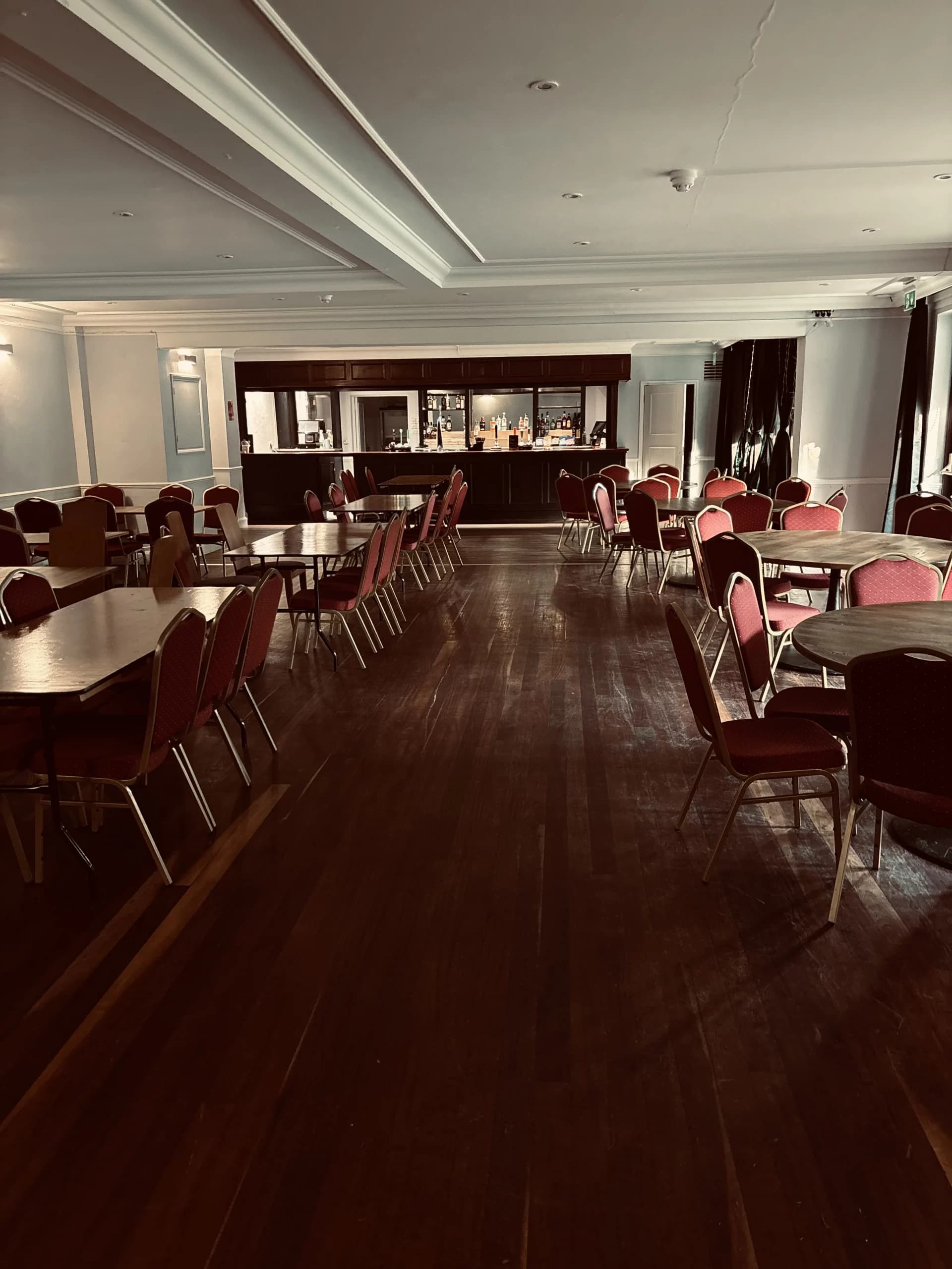 The Belgrave Room set for a wedding reception at The Limes Hotel